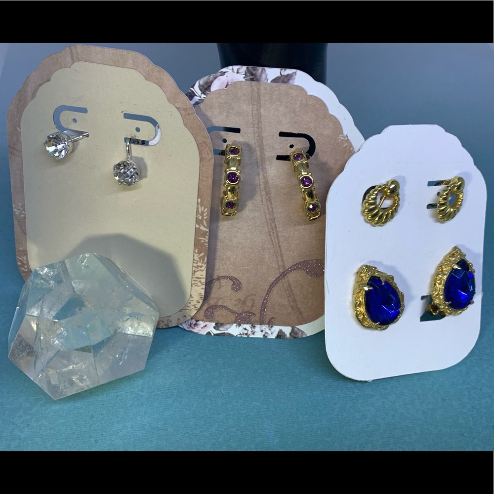 Vintage goldtone and silver clip on earrings.